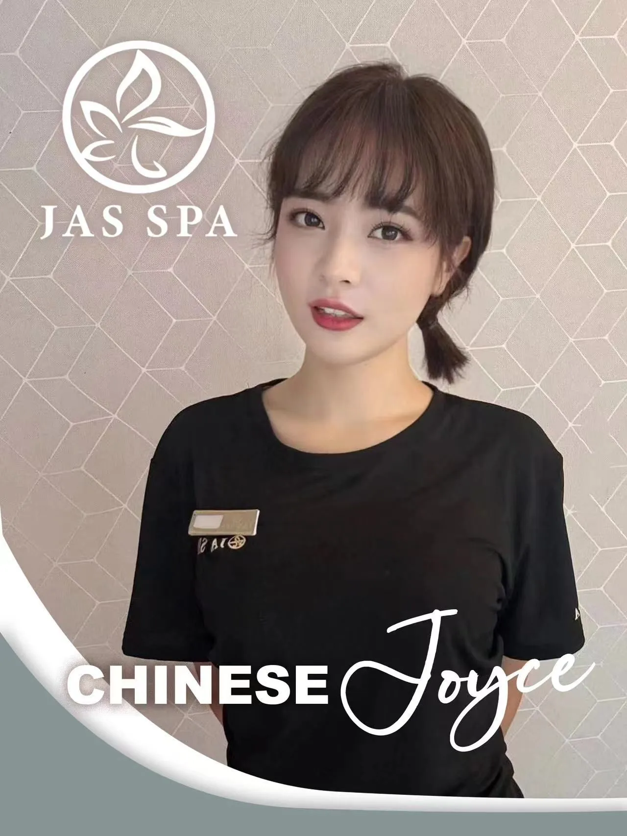 JAS Spa employee Joyce in branded uniform shirt.