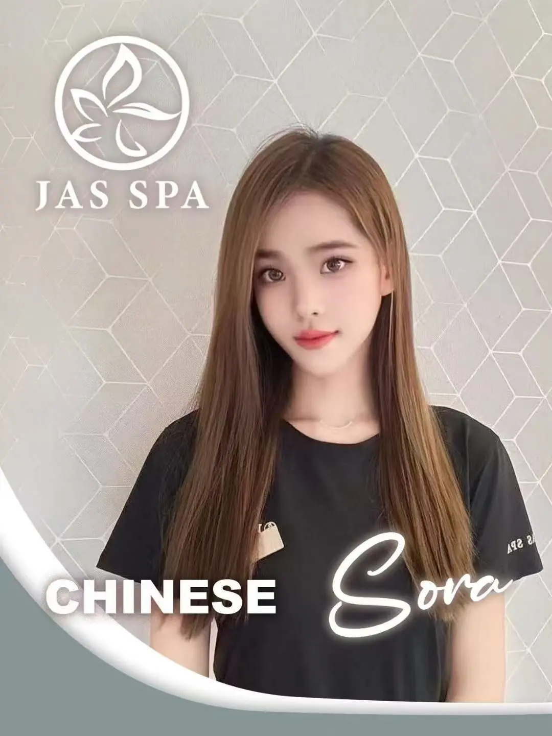 Jas Spa emplyoyee Sora Posing in branded uniform.