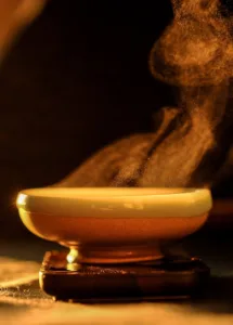 Steam rising from a warm ceramic bowl